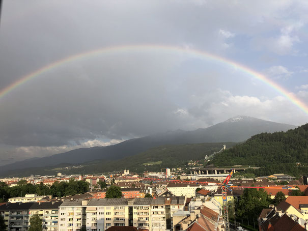 Photo by Irene Huber: Rainbow over Innsbruck