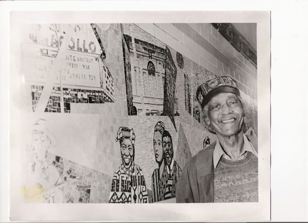 VINCENT SMITH in front of 116 st  subway mural