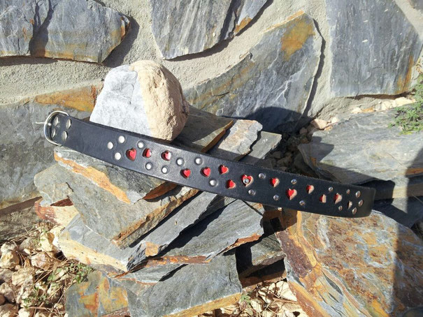 "Love is all around", 4 cm wide Black Latigo leather with many heart peepholes and rivets, 1 synthetic crystal in the centre heart, standard buckle, 60 euro, SAMPLE SHOW COLLAR 40 EURO!