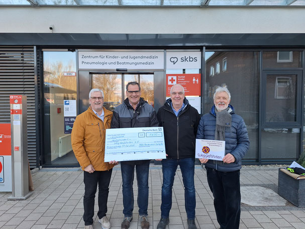 Peter Horn, Dirk Schwanke und Dieter Becker neben Dr. Thomas Lampe