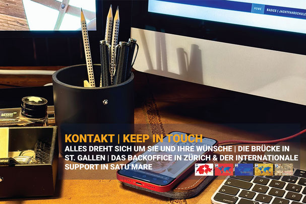 Arbeitsplatz mit Computer und Smartphone im HOZ Backoffice – Kontaktpunkt von THE AFK BRIDGE™ in St. Gallen und Zürich.