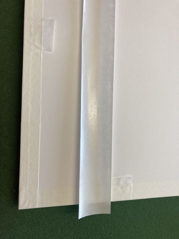 Rückenkarton wird doppelt abgeklebt