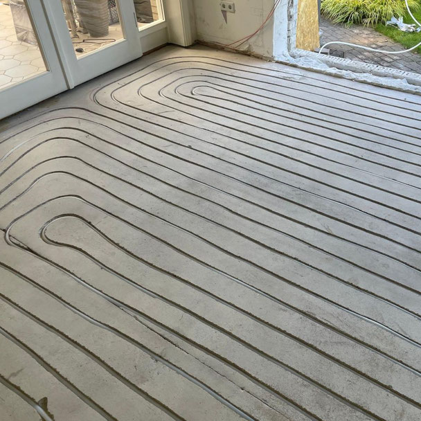 Fachmännische Vorbereitung einer Fußbodenheizung für die Verlegung von Parkett oder Vinyl durch Parkettwelt Adendorf