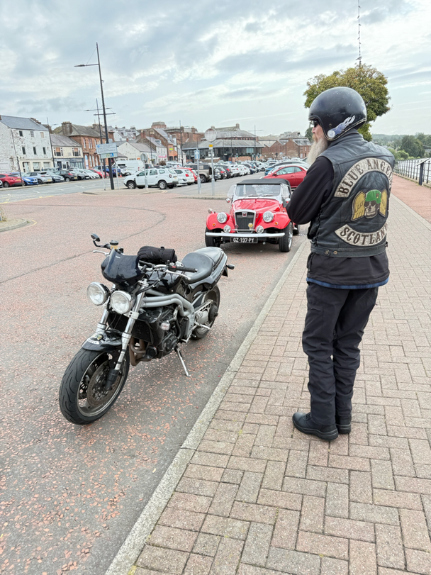 Spartan car with a biker