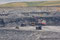 Besuch einer Kohlenmine (Tagbau). Die Region um Gillette (Wyoming) ist die Kohlekammer der USA mit gegen 20 Minen. Man achte auf den Grössenvergleich mit dem (US)-PW am rechten Bildrand.