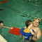 Circa 1993-94, CFNI days. Kevin in the pool with Brandon Sr and baby Brandon II. Credit Mr. Blake for the memories!