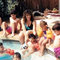 Family gathering! Kevin is the curly top in the pool, and Joe's in the pink shorts to the right. Plus uncle Josh,also in pink, right to (our) left of the curly haired lady, with the older boys.