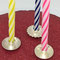 Buy a gift, cake candle holders in sterling silver for the birthday.
