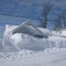 By mid-March 2014, cottages along East Lake Mitchell Drive had all the snow they could handle. 