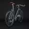 Bici single speed fixie e ruota libera. Cromata e finiture in marrone.