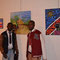 Frans Uunona (left) and his Artwork (center)