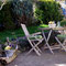 Terrasse im Garten, mit Grill und Sonnenliege
