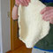pizza dough with the size of a baking tray