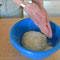 removing dough from bowl