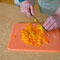cutting bell pepper in thin strips