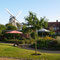 Der Park an der Mühle nach der Errichtung 2005/2006 mit Blick auf die vollzähligen Windflügel vom historischen Galerieholländer Venti Amica (Freundin des Windes) im Hintergrund. [© Foto: H.-J.Heck]