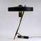 Bordslampa design Louis Kalff för Philips, 1950-tal. Stomme i mässing, skärm i lackerad metall. H.39cm.