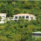 The house includes 30,000 gallon rainwater storage and generator