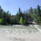 We absolutely intentionally did not cut trees in front of the house, since the views from indoors are excellent regardless and we preferred to have the home understated in honor of the long, natural shoreline.