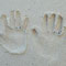 Handabdrücke im Sand mit Ringen · Hochzeitsfotograf OWL · kreative Detailfotografie