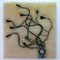 Octopus | Matches, power cord and hard drive on wood | 2005 | 70 x 70 cm