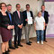 Nicole Bruchhäuser (Beratungsstelle für barrierefreies Wohnen), Dr. Matthias Heuberger (IZGS), Christian Linke (DRK Wiesbaden), Prof. Dr. Michael Vilain  (IZGS), Christa Eng (Ehrenamtliche) und Christoph Manjura (Sozialdezernent der Stadt Wiesbaden)