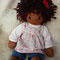"Amera" zur Direktadoption - April 2020 - 30er Gliederpuppe, Haut Caffè Latte, Haar dt. dunkelbraunes Bouclé Mohair, Augen dk.braun m. Lp. Empire-Kleid, Leggings, Häkelblütenhaarband