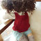 Emilia - 45er Babypuppe - März 2015 - mit dunkelbraunem Bouclé-Mohair (lockig), dunkelbraunen Augen m. Lichtpunkten, Pumphose, Stiefelchen m. Blüten, Strickträgerkleid m. Blüten, Shirt, Windel