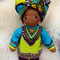 Für Annabell - Februar 2020 - 30er Gliederpuppe, Haut Caffè Latte, Augen dunkelbraun m.Lp., Haar dt. Bouclé dunkelbraun, afrikanisches Outfit aus Stoffen der Familie aus Gambia
