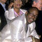 1998 with Bobby Brown (Versace Fashion Show)