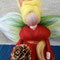 Handgefertigte Weihnachtsstern Fee aus feiner Märchenwolle – liebevolle Filzkunst, ideal als Weihnachtsdeko, Jahreszeitentisch oder Geschenk.