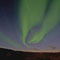 Kräftige Polarlichter über dem Eismeer im Norden von Norwegen