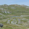 Einsamer Stein in weiter Landschaft