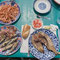 Brasse, Sardinen, Tintenfisch und Garnelen als leckeres Mittagessen