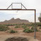 Blick vom Brunnen der Oase zu den Bergen der Sahara