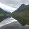 Berge spiegeln sich im See Eidsvatnet zwischen Geiranger und Eidsdal