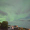 Selbst hinter der Wolkendecke wirken die Polarlichter sehr eindrucksvoll