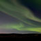 Mystische Polarlichter am Eismeer mit Vollmond