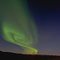 Die Polarlichter malen mystische Figuren an den Nachthimmel