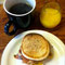 egg/prochuitto/cheese on english muffin, OJ (watered down), Coffee (cream added post pic)