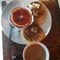 1/2 grapefruit w/ a little sugar, waffles w/ sugar & butter, coffee