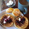 waffles and coffee, jam, orange, yogurt