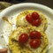 corn cakes w/ cheese and tomatoes