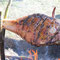 wird eine Schweinekeule geröstet.