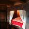 le lit en alcôve de la chambre 1 