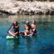 Girl power paddling in Meganisi Island, Greek Ionian Islands 