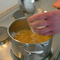 taking water from boiling pasta water for the sauce