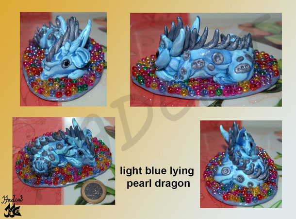 Hadcat polymer clay Fimo light blue lying pearl dragon