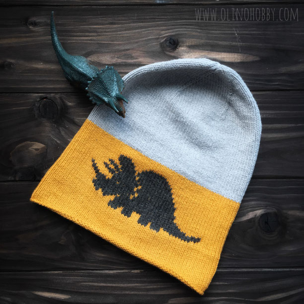 knitted bini hat with dinosaur pattern