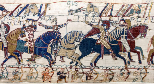 The standard bearer is the knight who carries the King's flag. A scene from the Bayeux Tapestry.